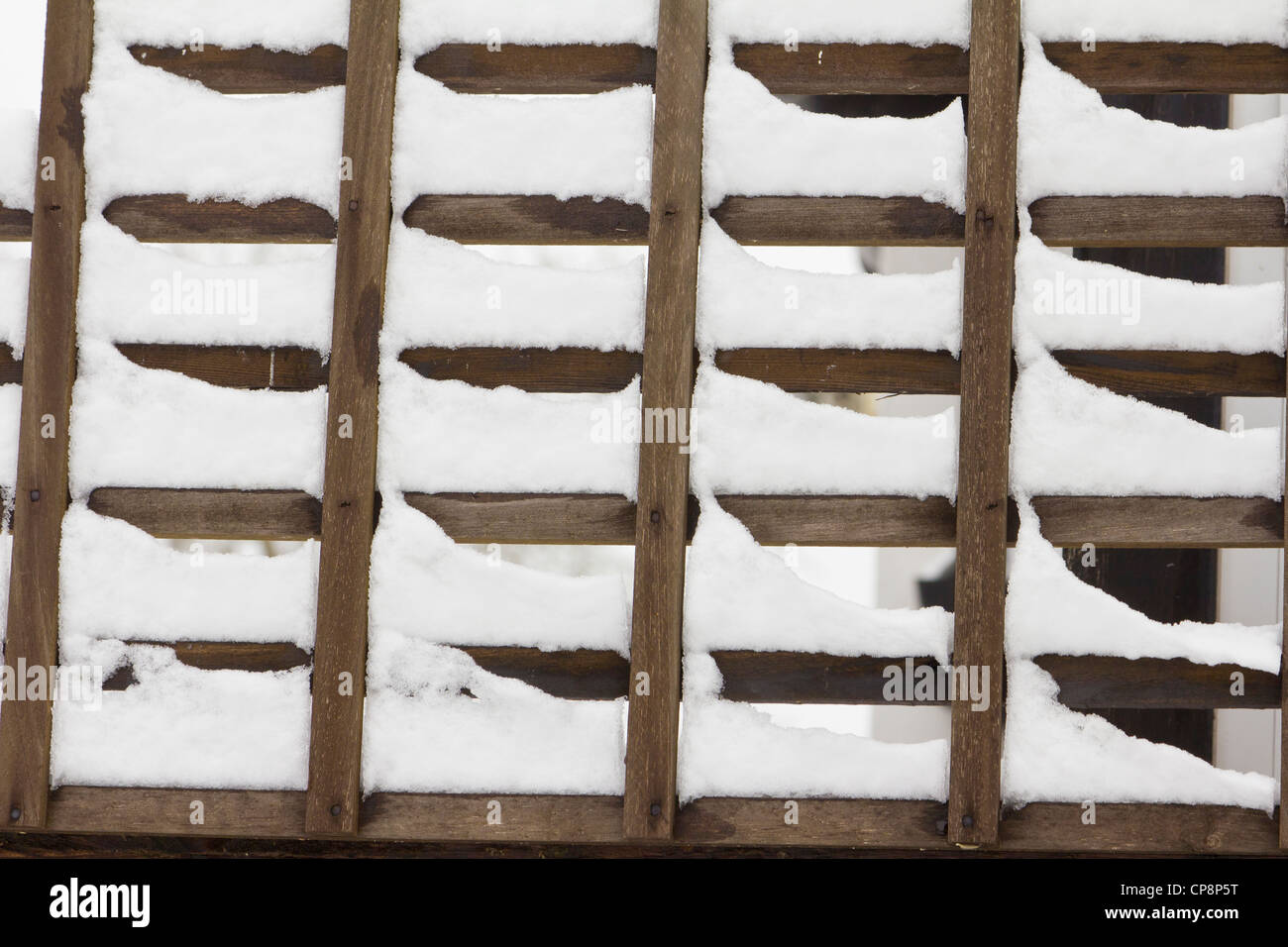 Snow covered wooden fence Stock Photo - Alamy