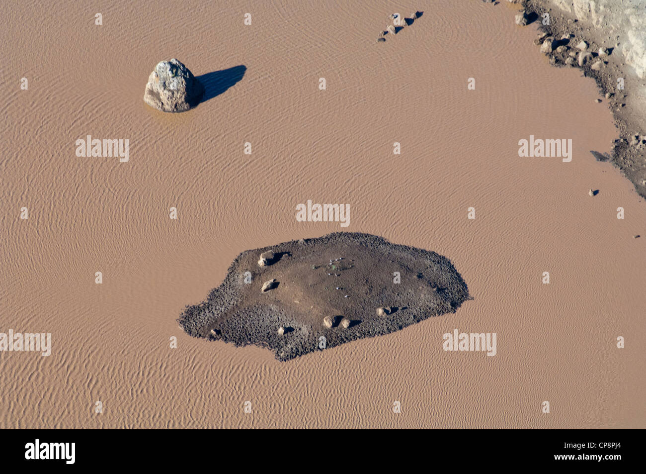 Rock and sand bank in a pool of water, aerial view, Arusha Region, Tanzania Stock Photo