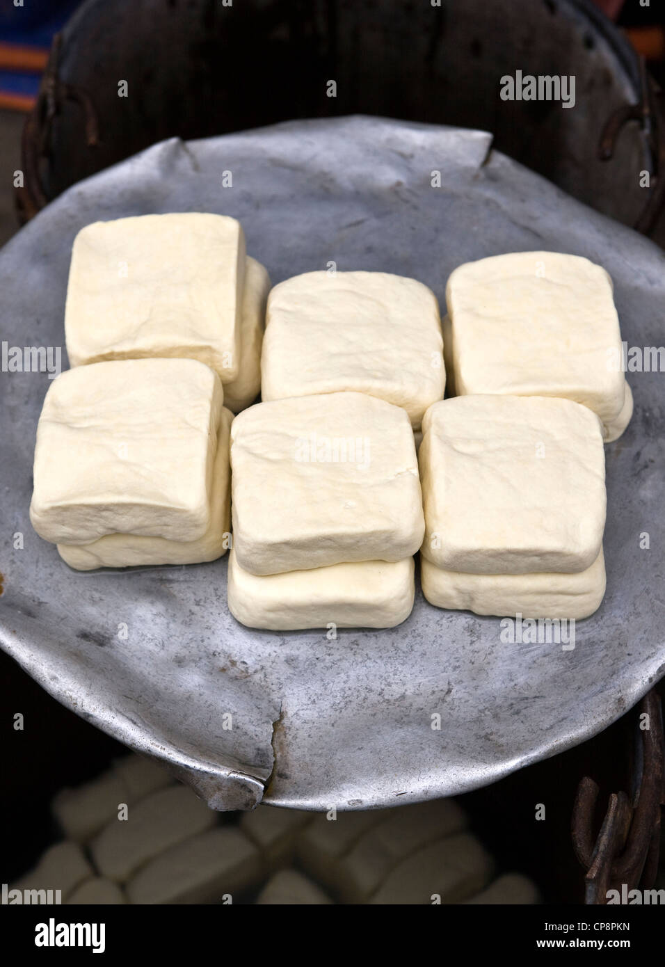 Tofu on sale in market Stock Photo