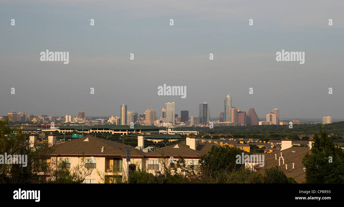 A view over low-rise buildings towards the Austin, Texas skyline. Stock Photo