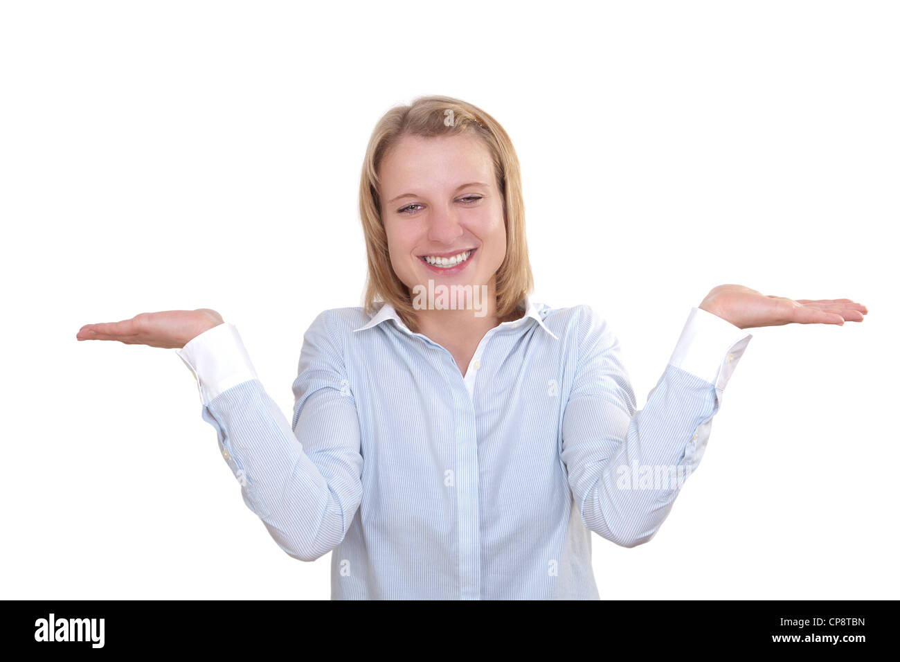 Young woman shrugs her shoulders in a clueless gesture Stock Photo Alamy