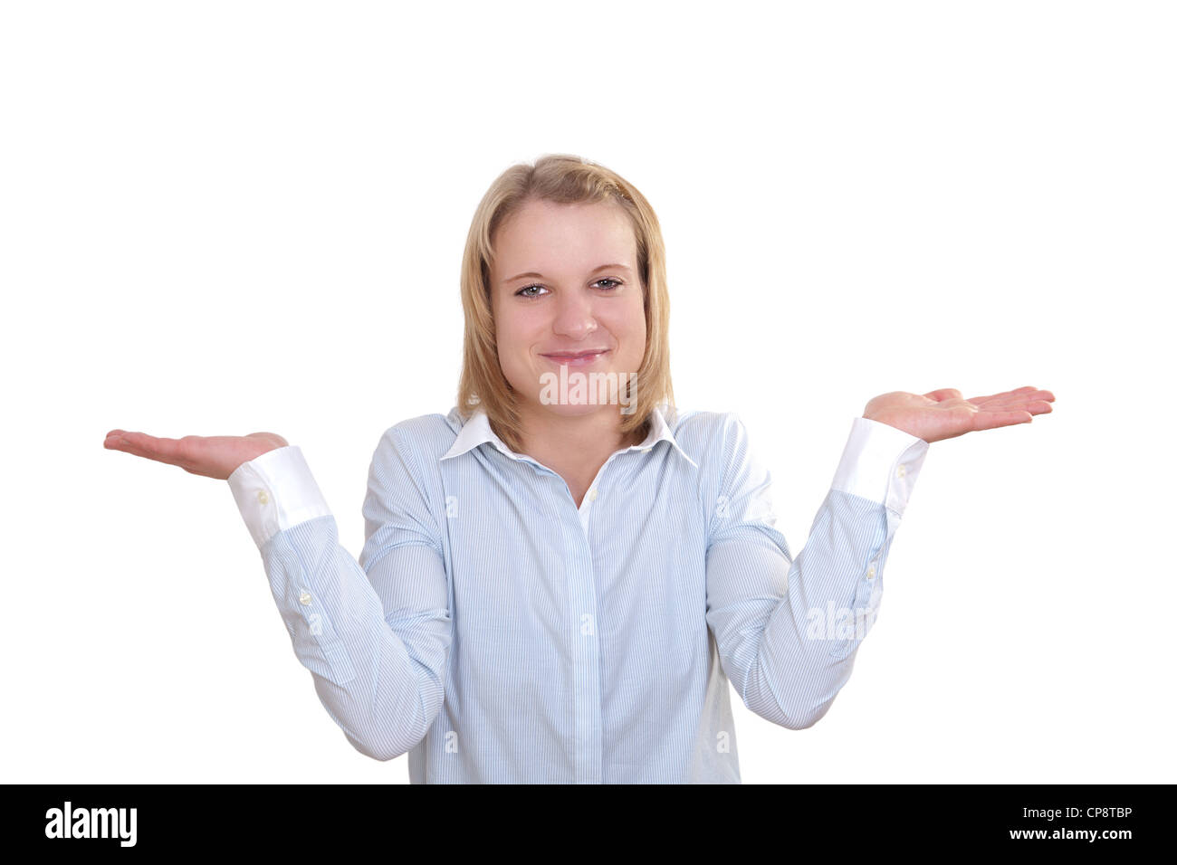 Young woman shrugs her shoulders in a clueless gesture Stock Photo Alamy