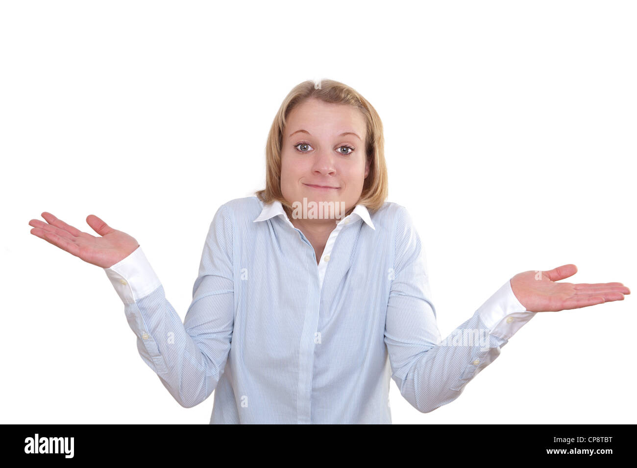 Young woman shrugs her shoulders in a clueless gesture Stock Photo Alamy