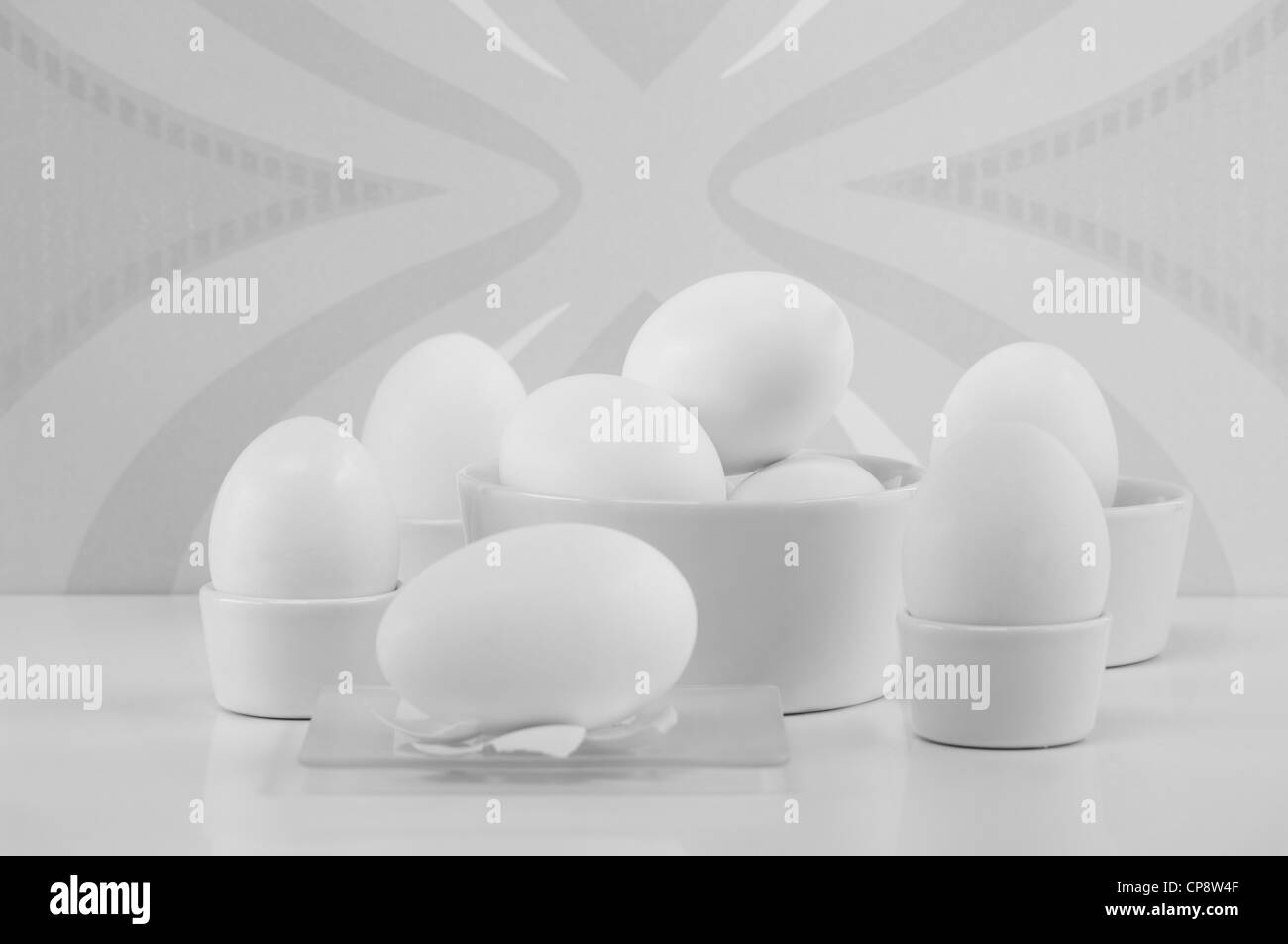 White eggs in egg cups, close up Stock Photo Alamy