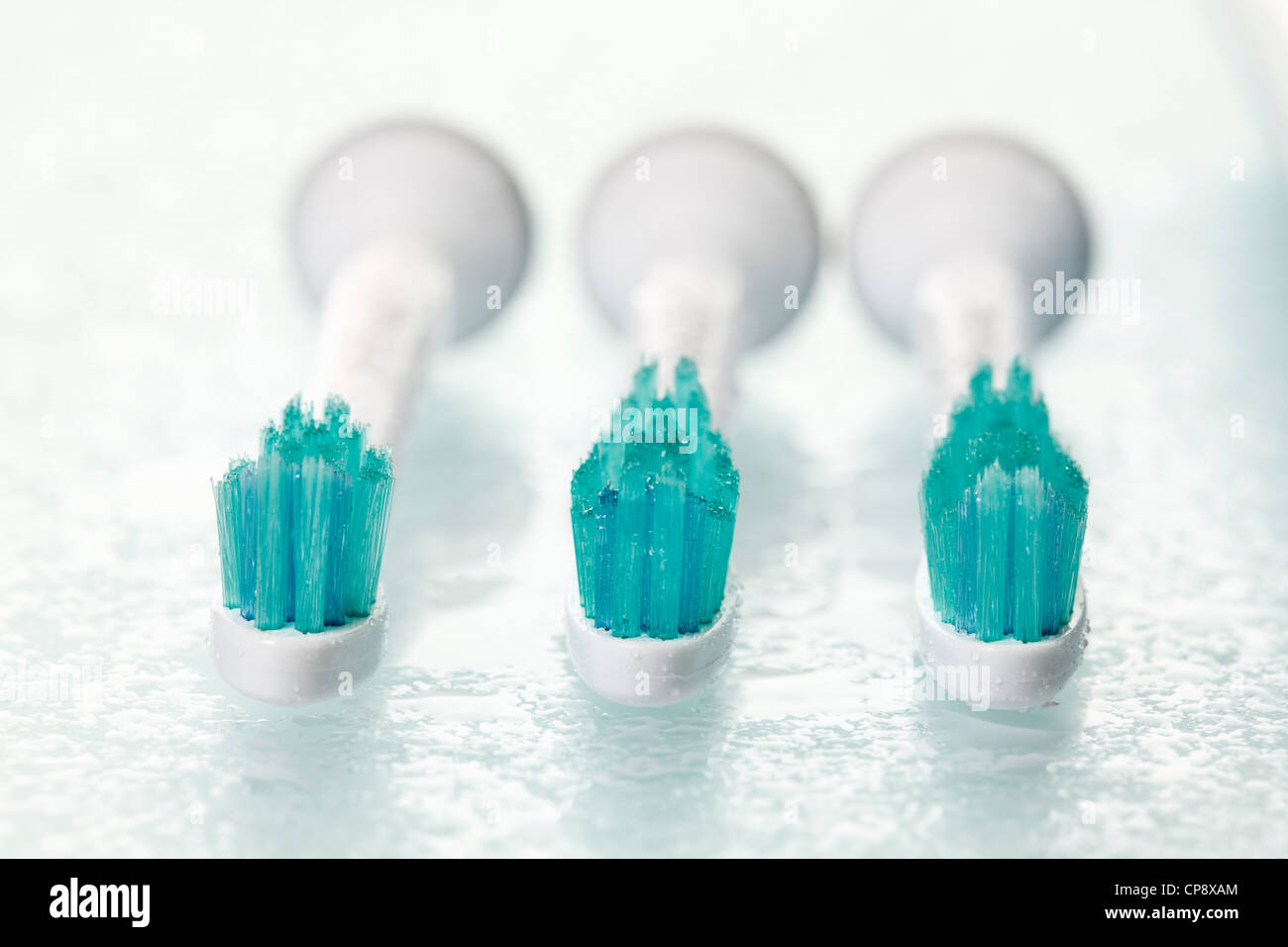 Electric toothbrushes on white background, close up Stock Photo - Alamy