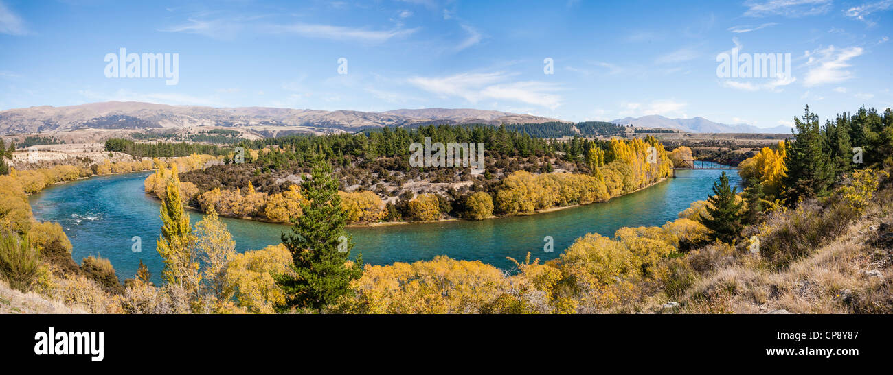 Panorama of the Clutha River near Luggate in Central Otago, South Island, New Zealand, with autumn colours. Stock Photo