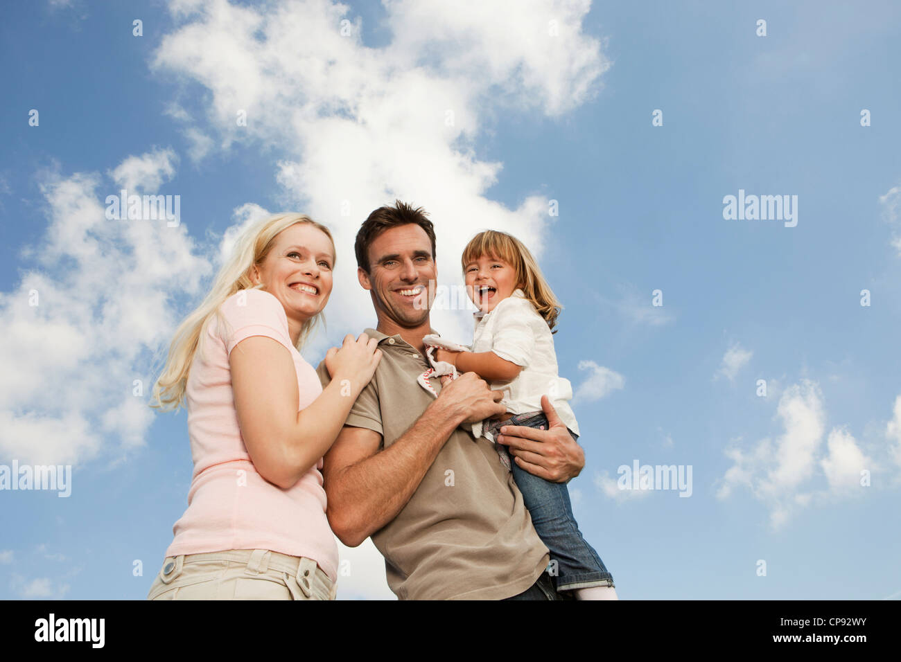 Spain, Mallorca, Palma, Family standing together, smiling Stock Photo