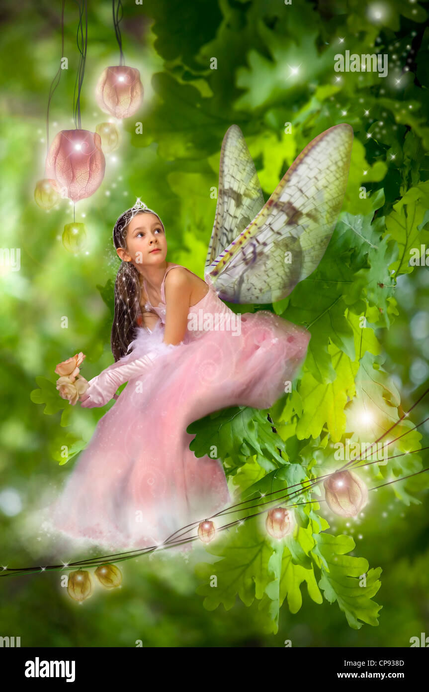 Beauty little fairy on the foliage in the wood expecting the beginning of  magic party Stock Photo - Alamy