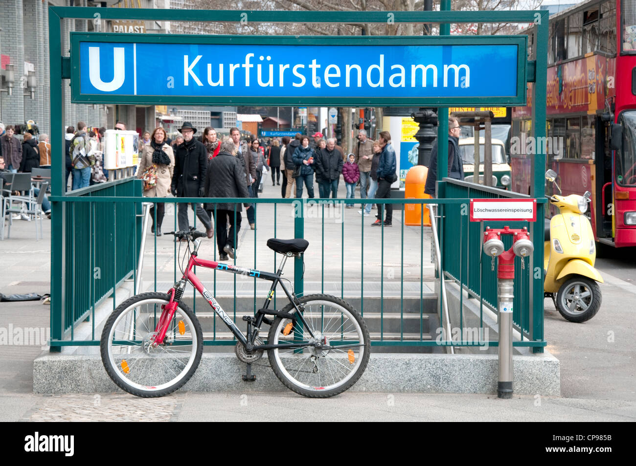 Berlin, Germany. Kurfurstendamm U-Bahn (underground) station. Bicycle chained to the railings Stock Photo