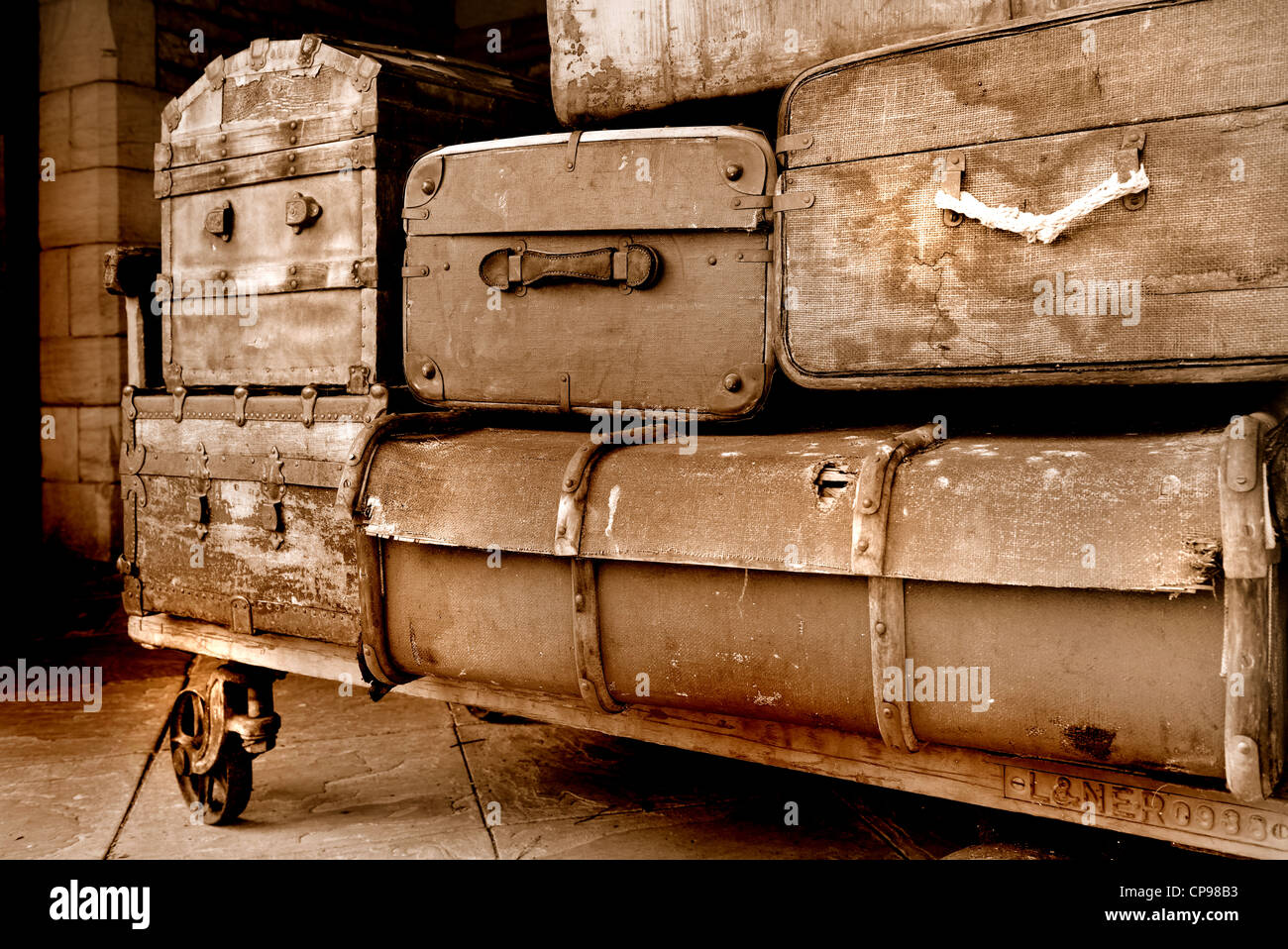 Victorian baggage cart sepia Stock Photo