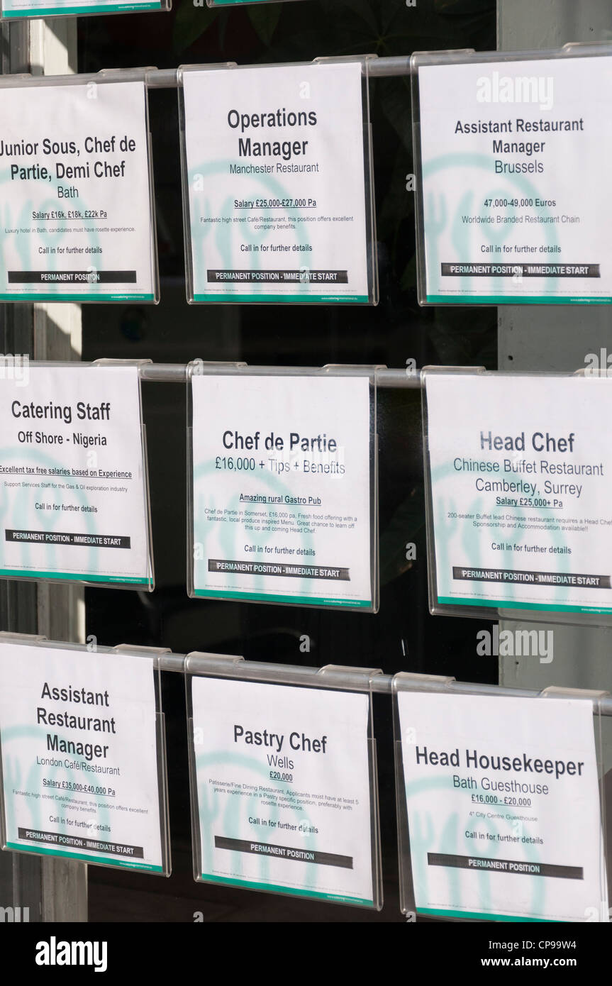 Job vacancies advertised in a recruitment agency window Stock 