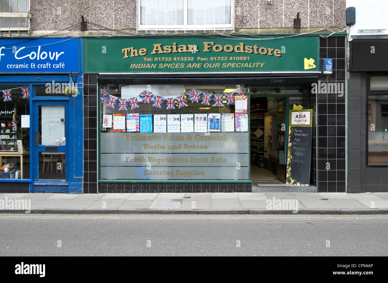 Asian food store grocery shop on UK high street Stock Photo Alamy