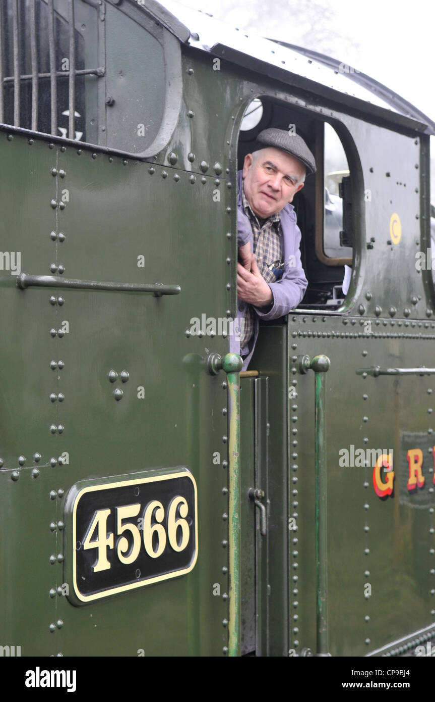 The driver of the GWR prairie tank 4566 in the cab waiting for the