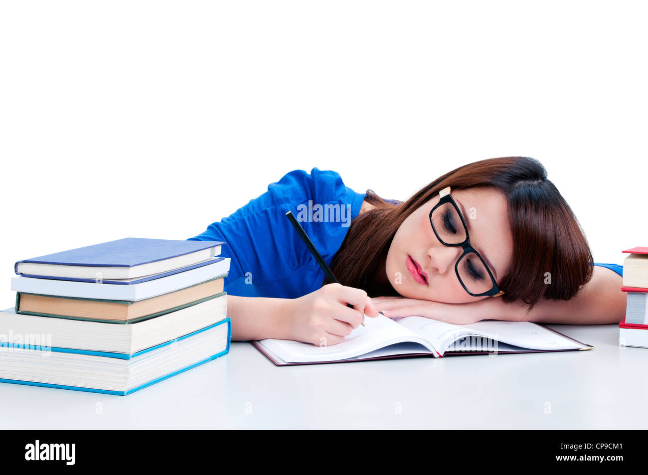 Beautiful young woman writing Stock Photo - Alamy