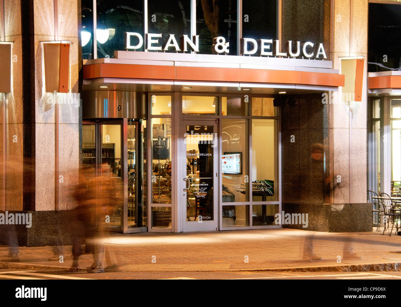 Dean and Deluca gourmet food store in downtown Charlotte, NC, North Carolina, at night. Stock Photo