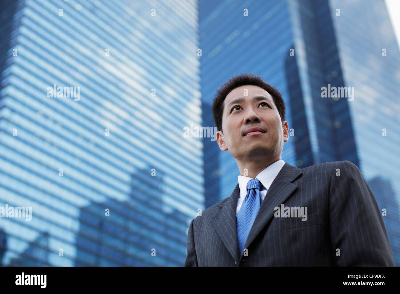 Asian mature man standing hi-res stock photography and images - Alamy