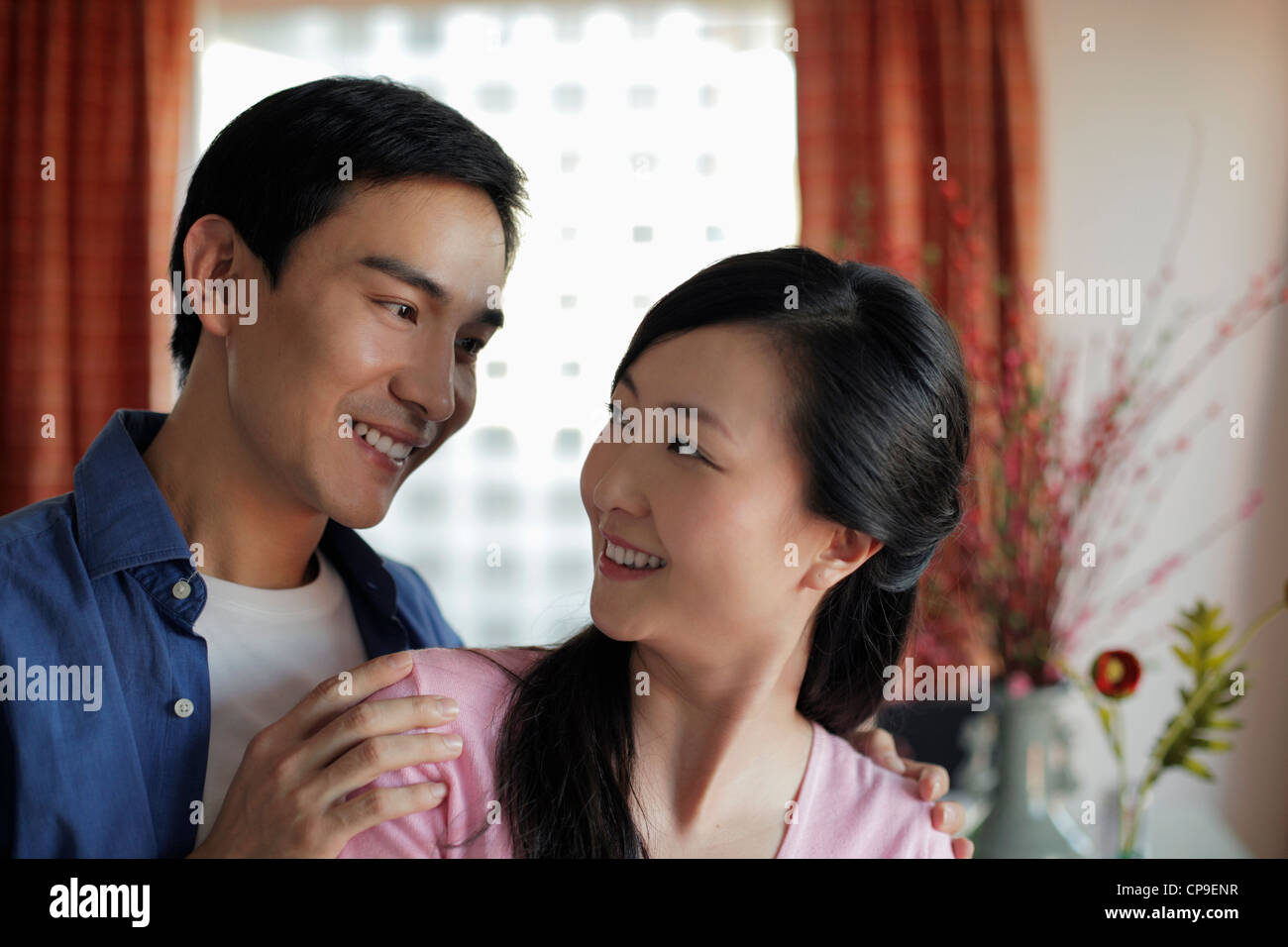 Couple with arm around each other hi-res stock photography and images ...
