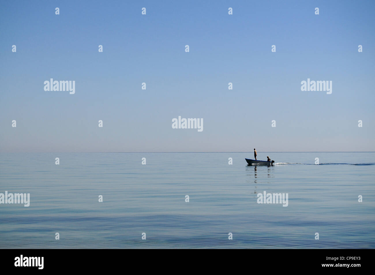 Two fisherman in fishing boat hi-res stock photography and images - Alamy