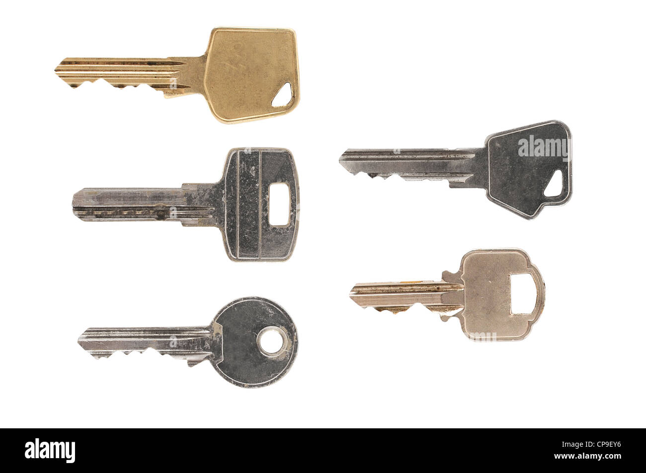 Five different kinds of door keys on white background Stock Photo