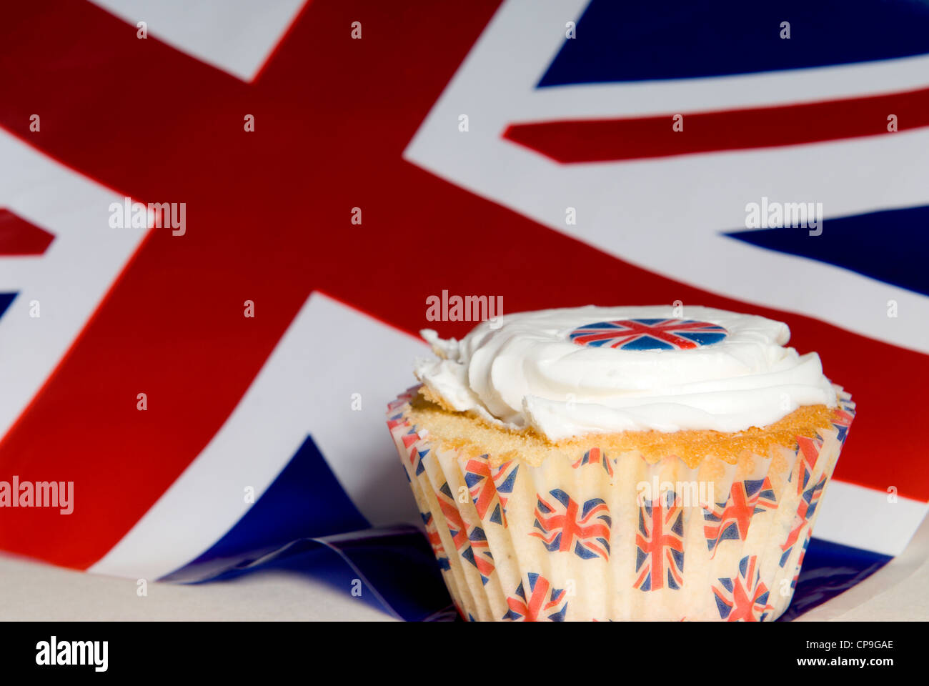 A celebration cupcake, Union (Jack) flag and sticker. Ahead of Her Majesty the Queens Jubilee ...