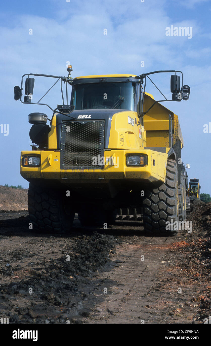 A South African 'Bell Dumper Truck B4OD', operating in an expanse of terrain upon a construction-site for land redevelopment. Stock Photo