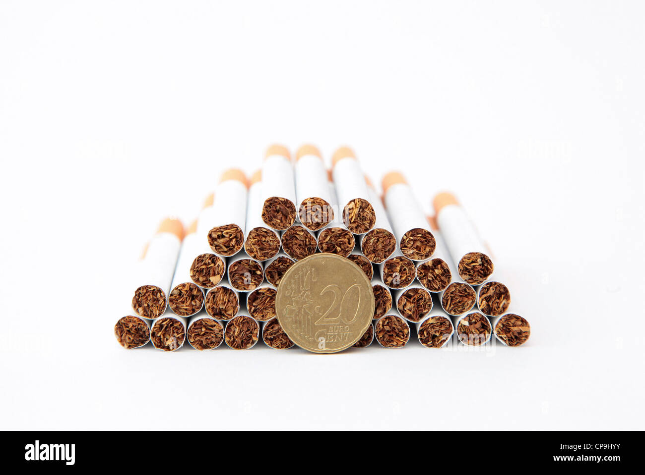 Cigarettes and  twenty eurocent Stock Photo