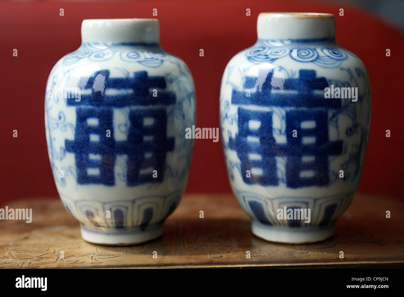 Chinese pottery jars with Double Happiness or Shuangxi. Stock Photo