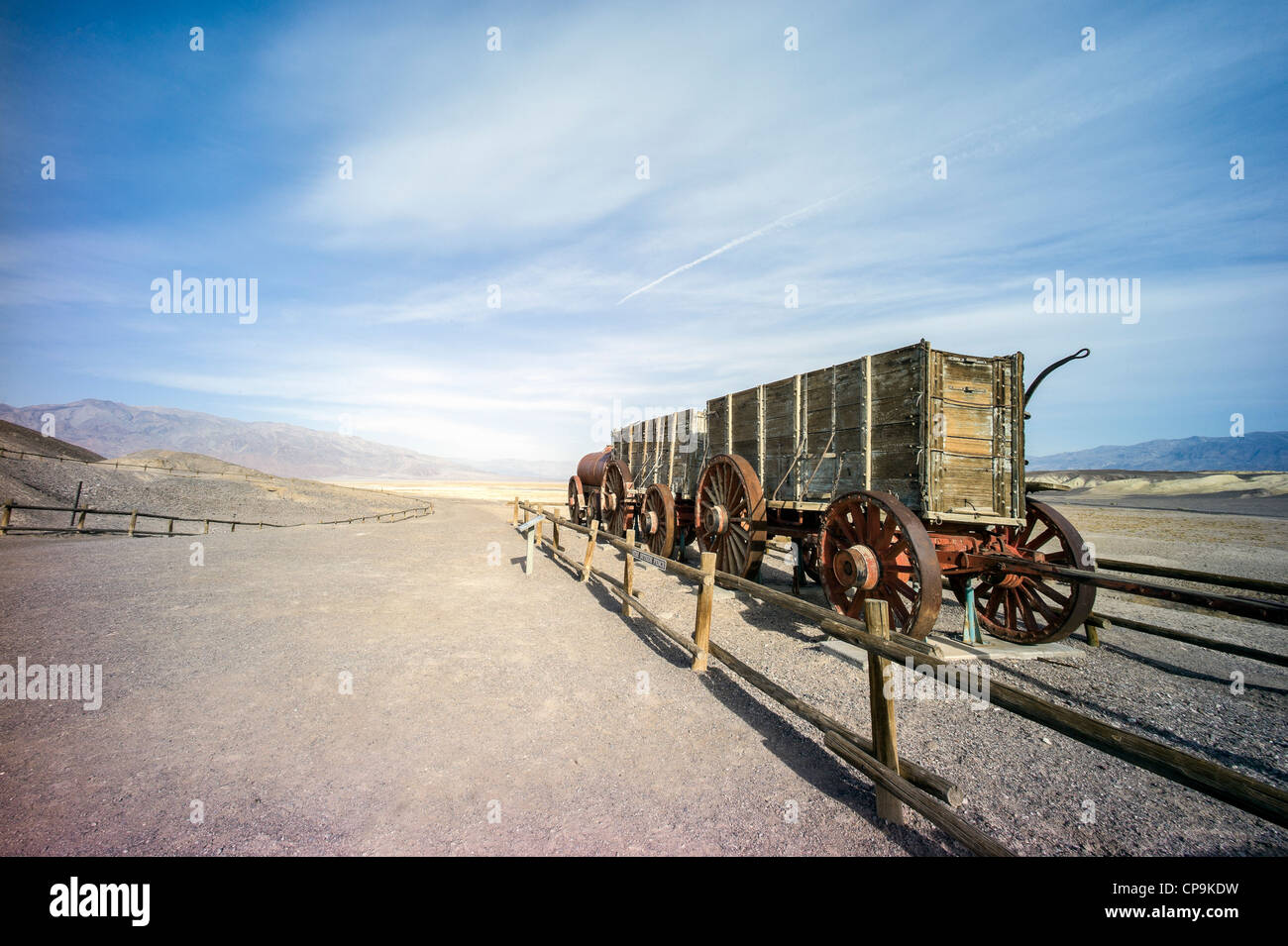 Ruins of the Harmony Borax Works with Twenty Mule Team ore wagons and water tanker Death Valley National Park, California, USA Stock Photo