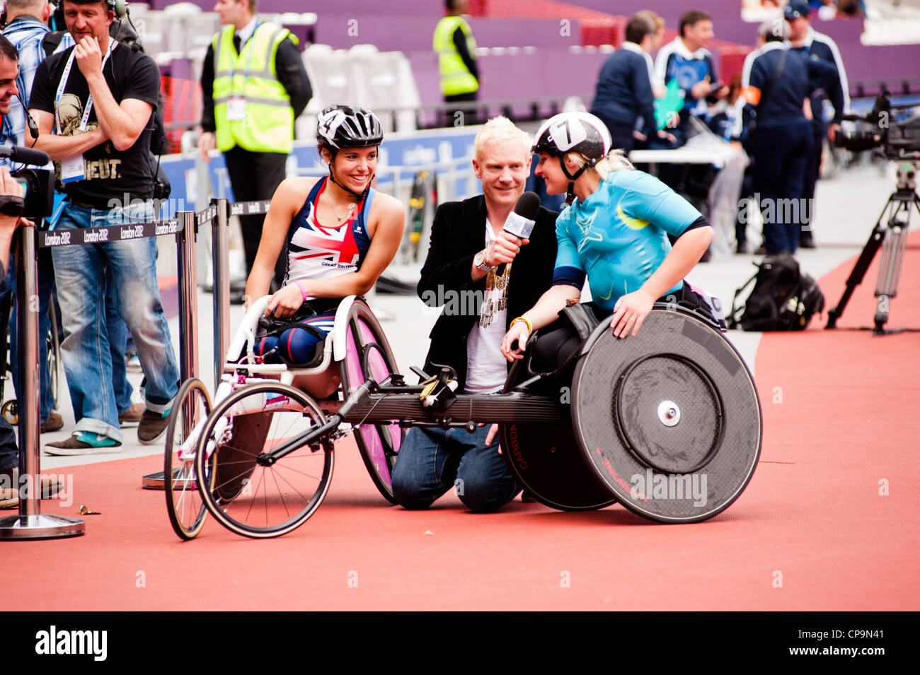 Athletes interviewed t the Visa London Disability Athletics Challenge at the Olympic Stadium in London on May 8, 2012. Stock Photo