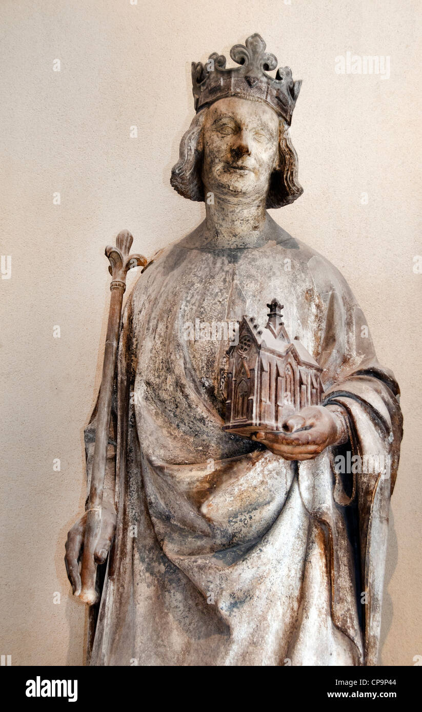 King Charles V of France, known as Charles the Wise, holding a model of a church, sculpted circa 1364–1370  Richelieu Wing Louvre Museum in Paris Stock Photo