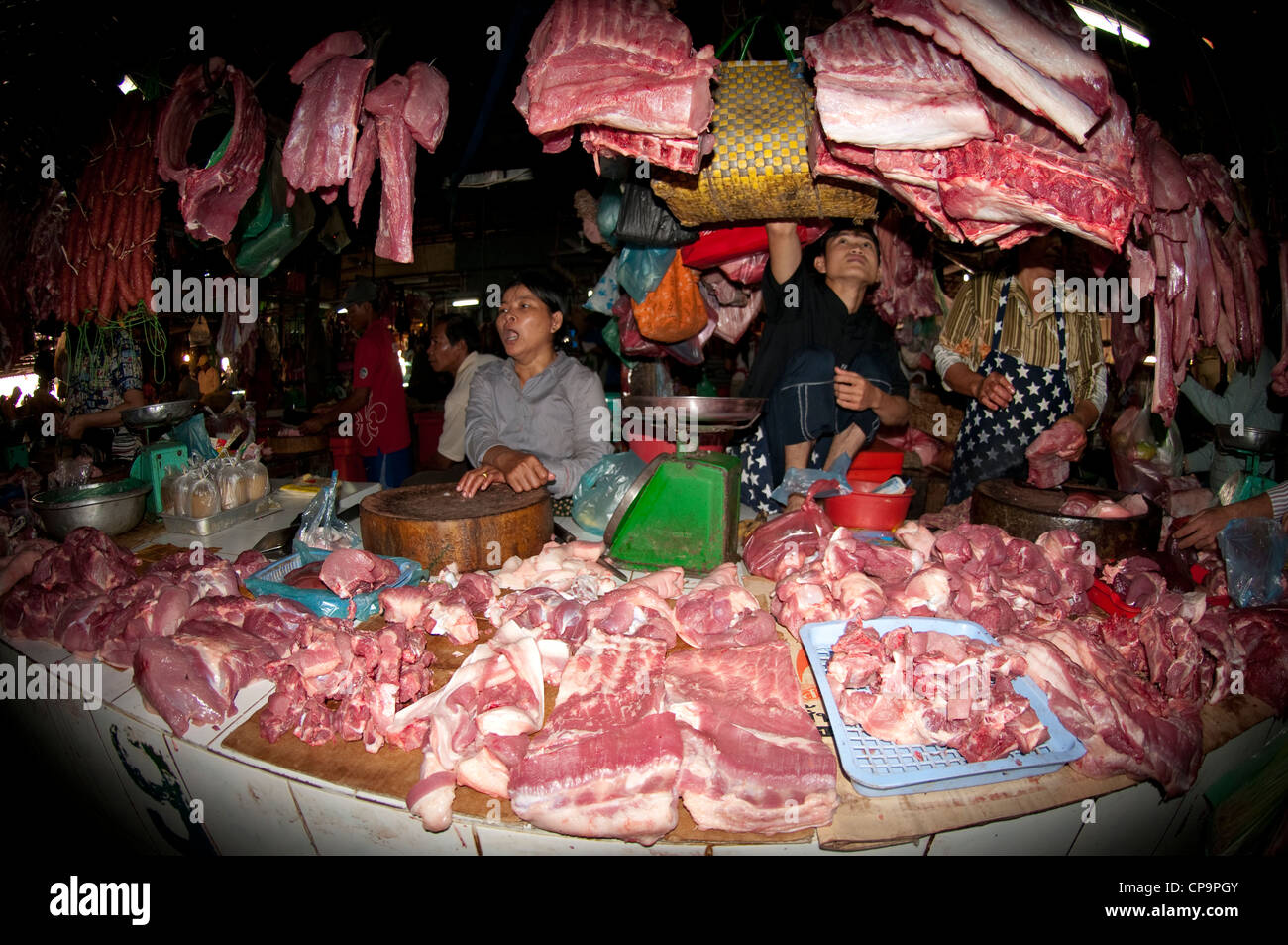 Butchers in indoor market, Siem Riep, Cambodia, Asia Stock Photo