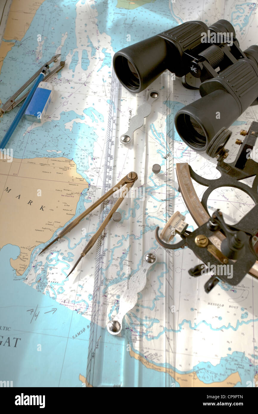 Marine navigation instruments, charts and binoculars, for seamen. Stock Photo