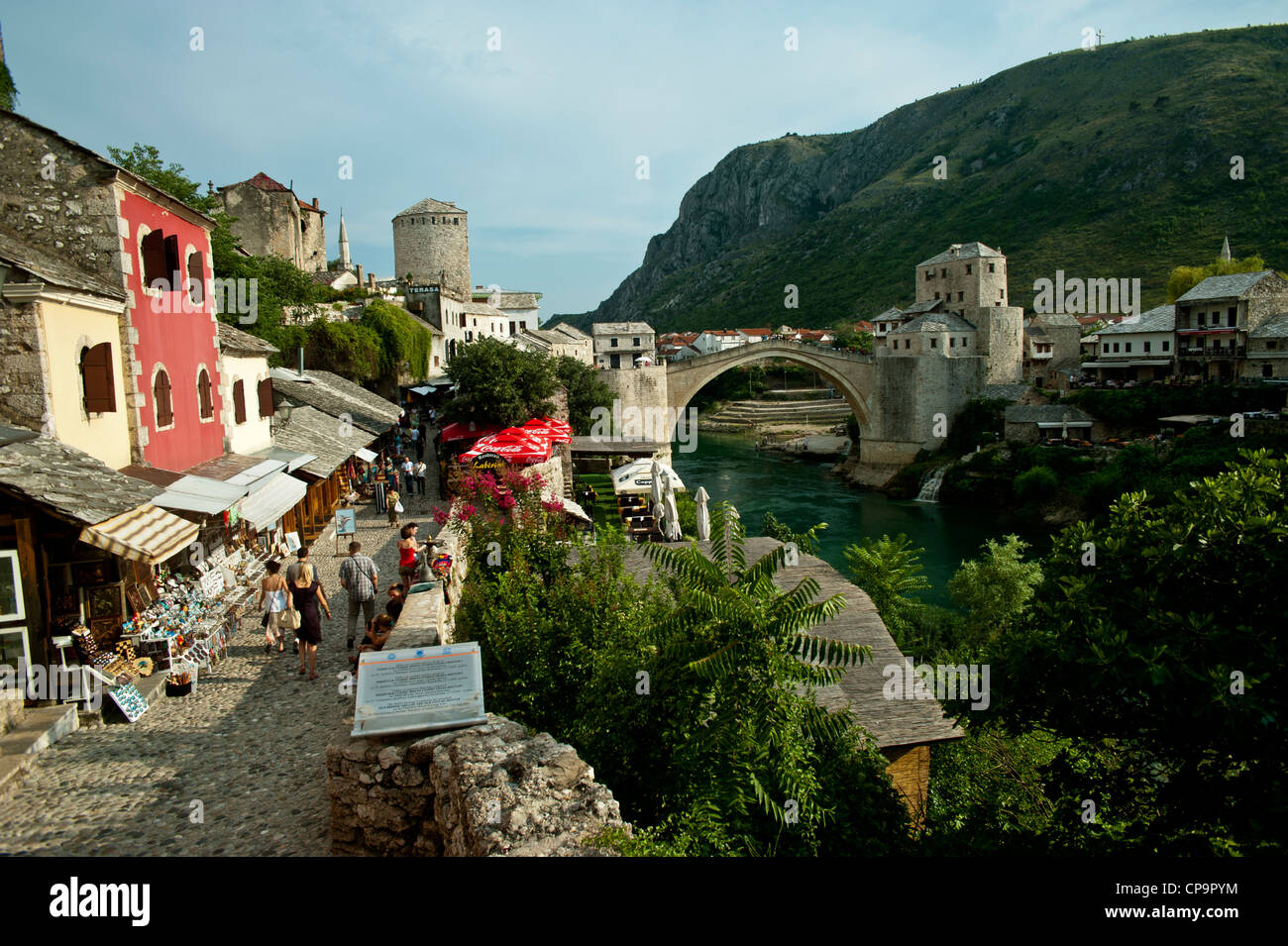 Cobbled street and the Stari Most Peace Bridge on the Neretva river.Mostar.Bosnia- Herzegovina.Balkans.Europe. Stock Photo