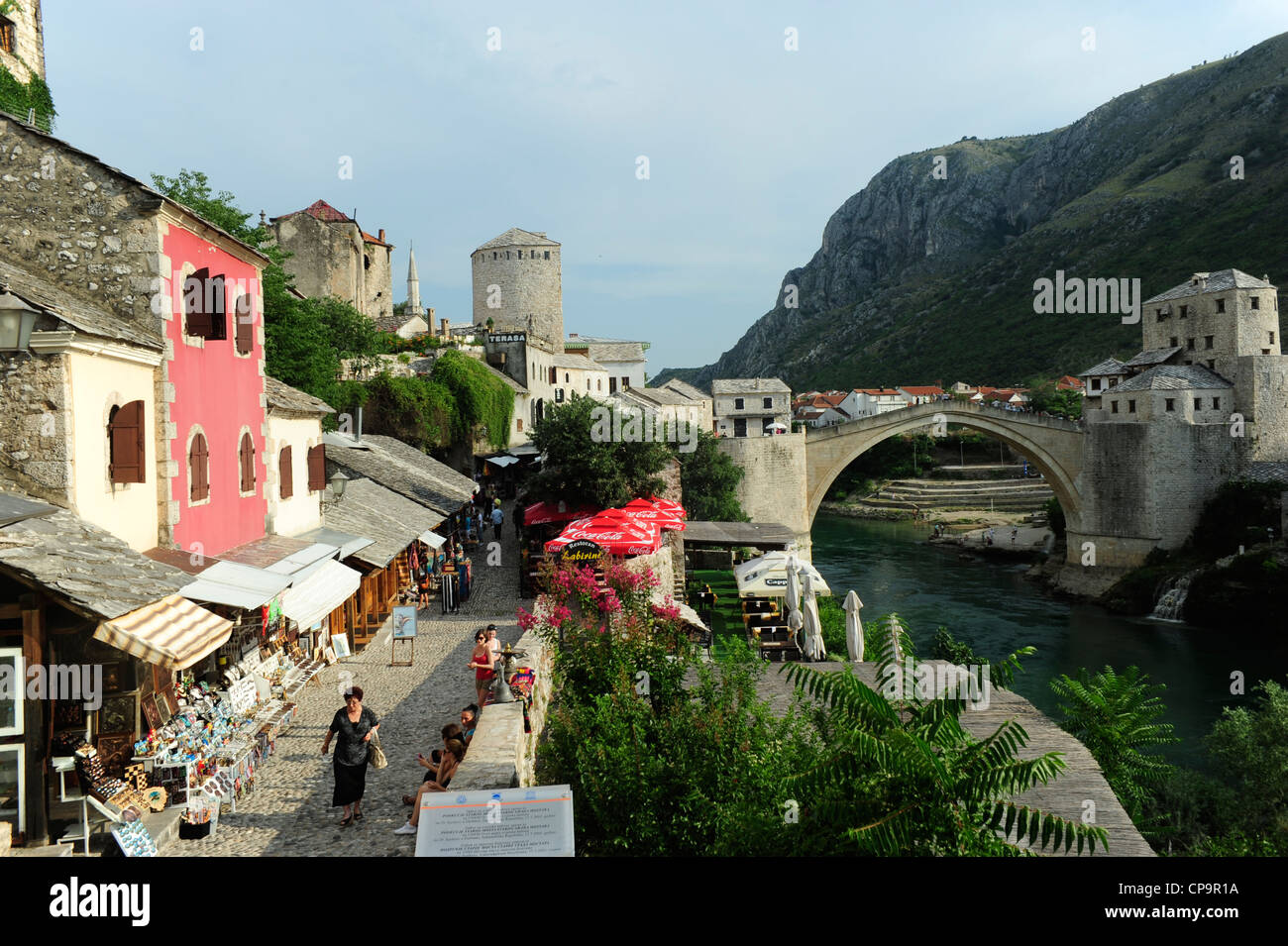 Cobbled street and the Stari Most Peace Bridge on the Neretva river.Mostar.Bosnia- Herzegovina.Balkans.Europe. Stock Photo