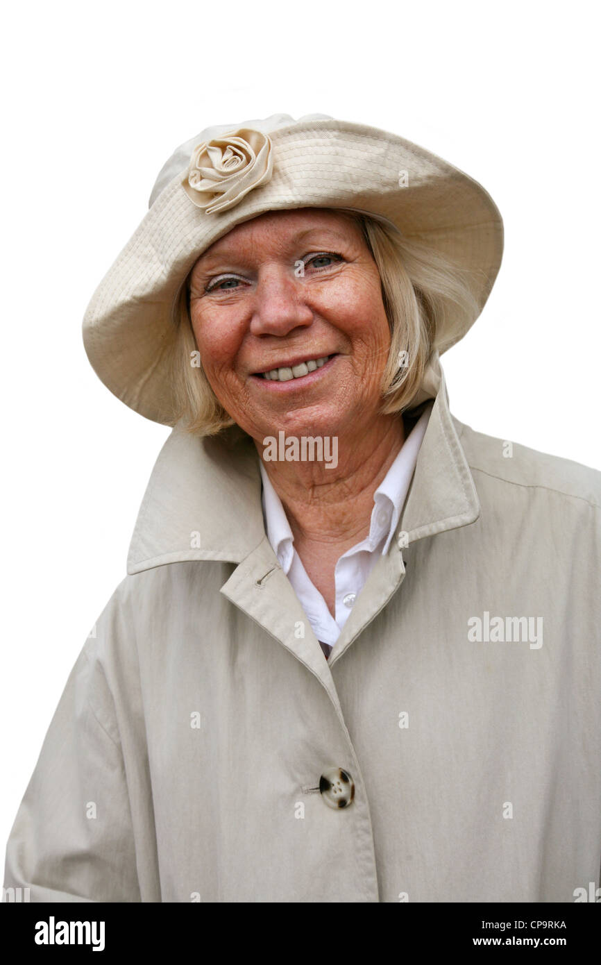 Elderly woman with rainclothes Stock Photo