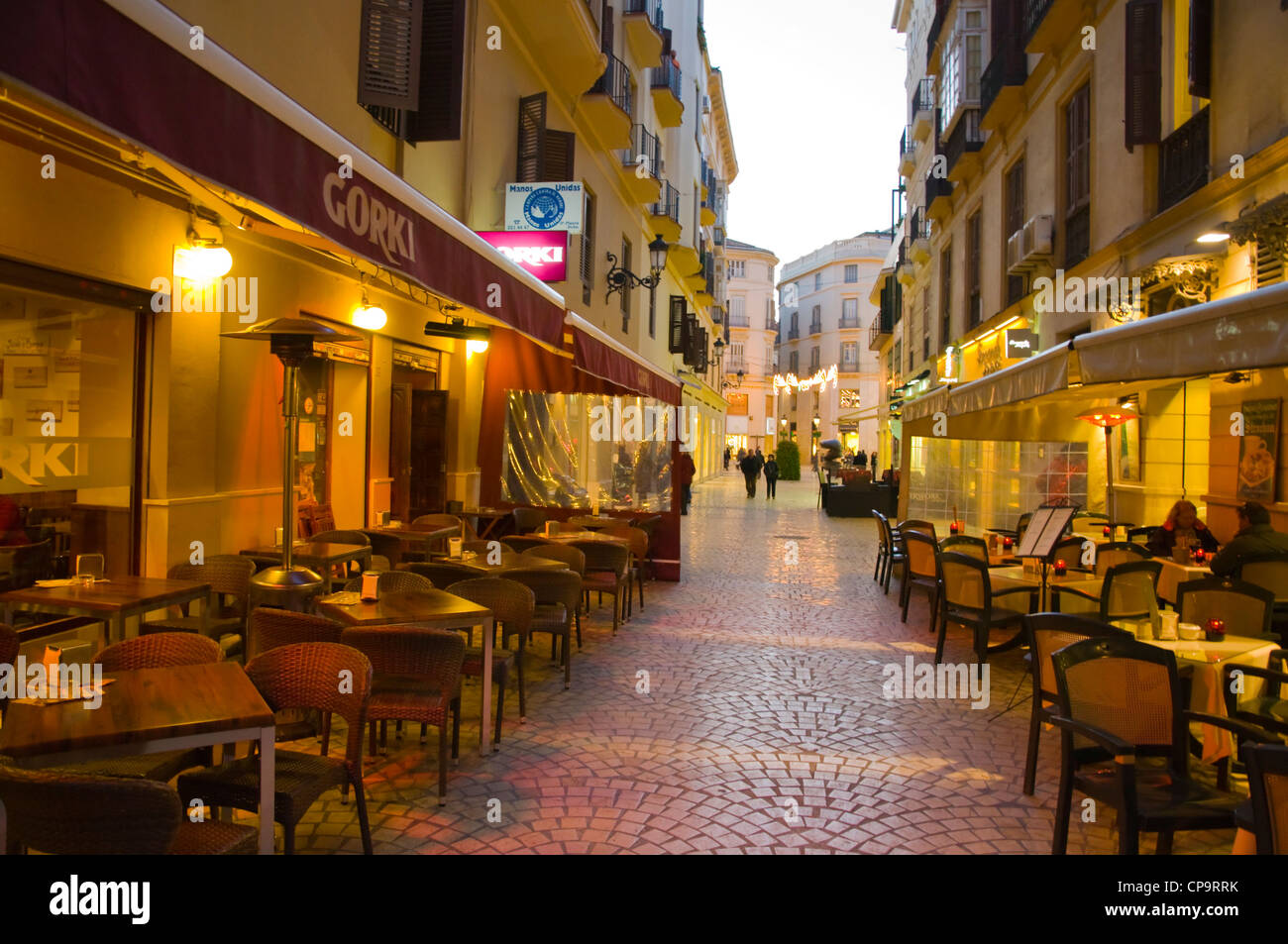 calle-strachan-street-with-restaurant-terraces-at-night-malaga