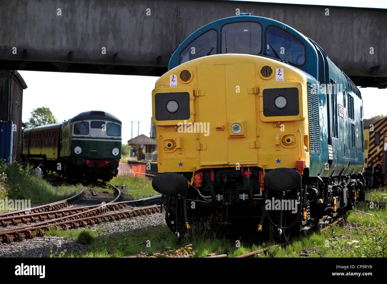 Diesel locomotive restored at Caledonian Railways under the bridge at Dun station. Stock Photo