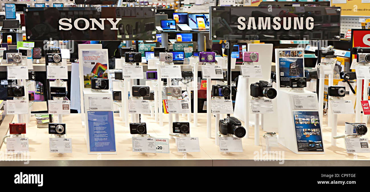 Sony and Samsung cameras on sale in electronic equipment store, Wales, UK Stock Photo