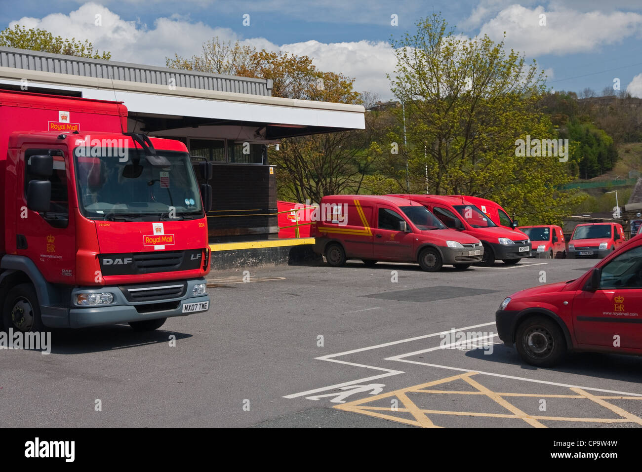 Royal Mail vehicles in compound at Halifax sorting office Stock Photo