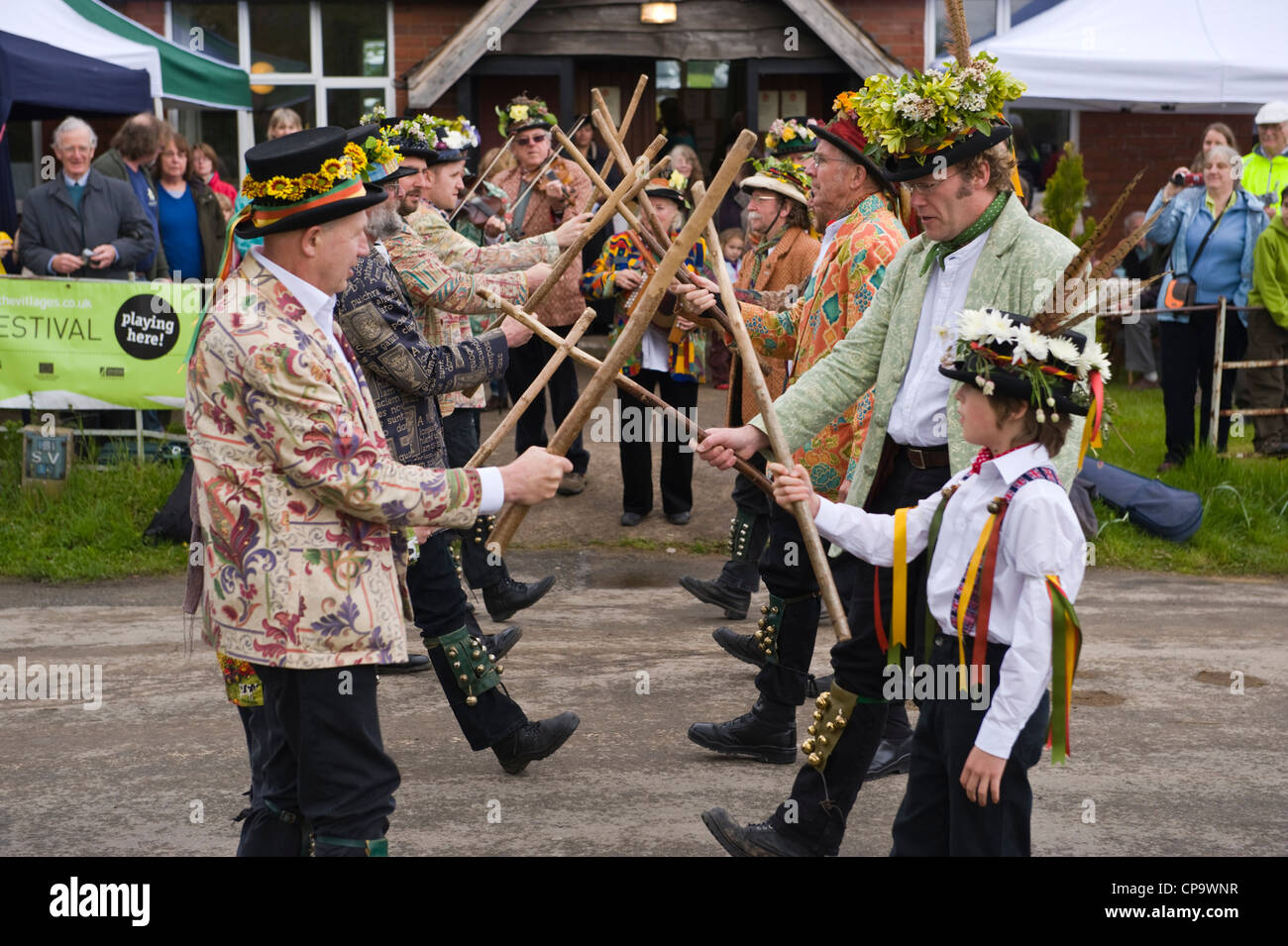 Leominster Morris Dancers perform part of THE BIG APPLE BLOSSOMTIME festival at the village hall Putley near Hereford Herefordshire England UK Stock Photo