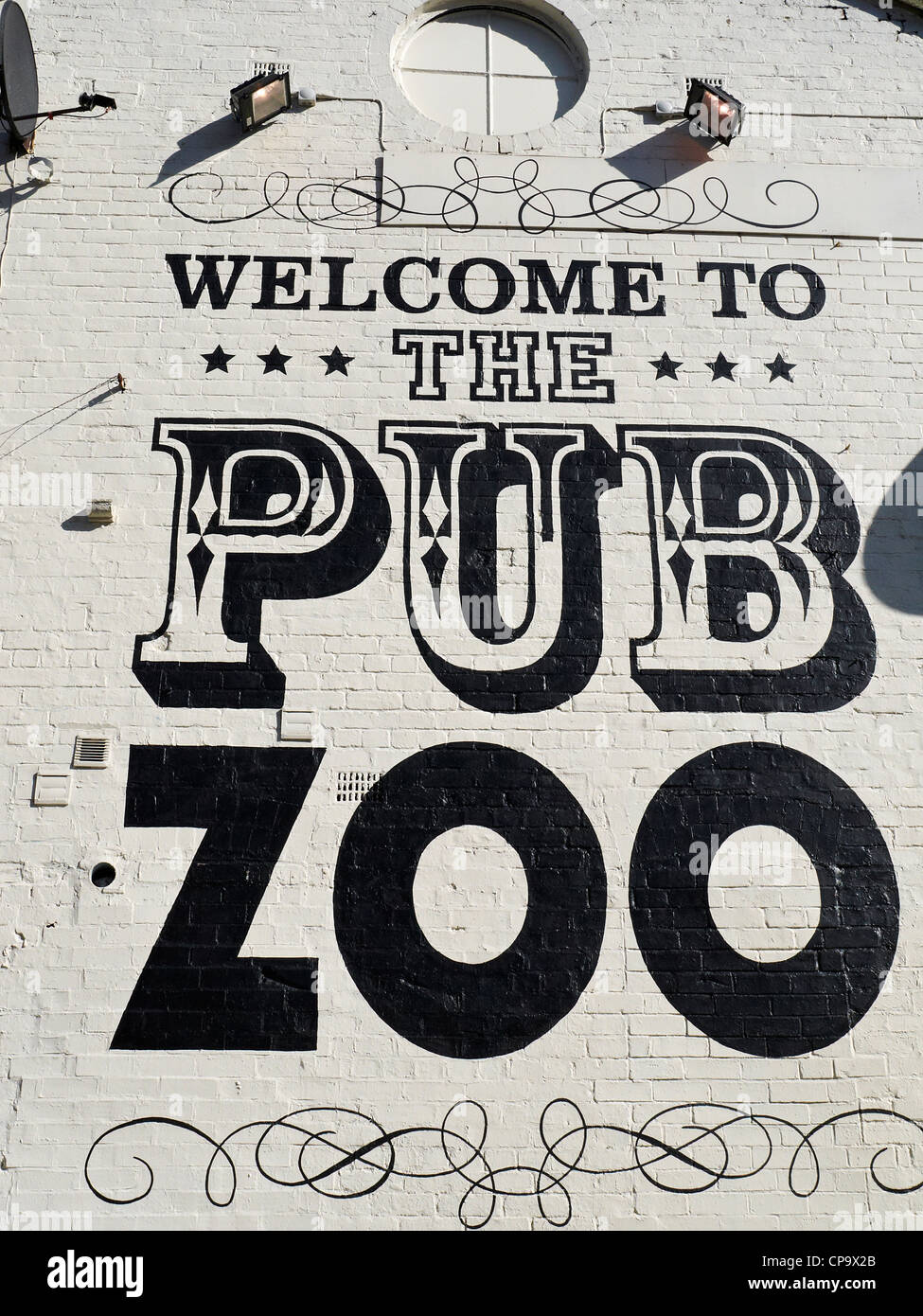 Welcome to the Pub Zoo writing on wall in Manchester UK Stock Photo
