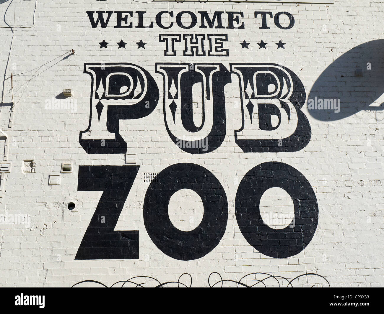 Welcome to the Pub Zoo writing on wall in Manchester UK Stock Photo