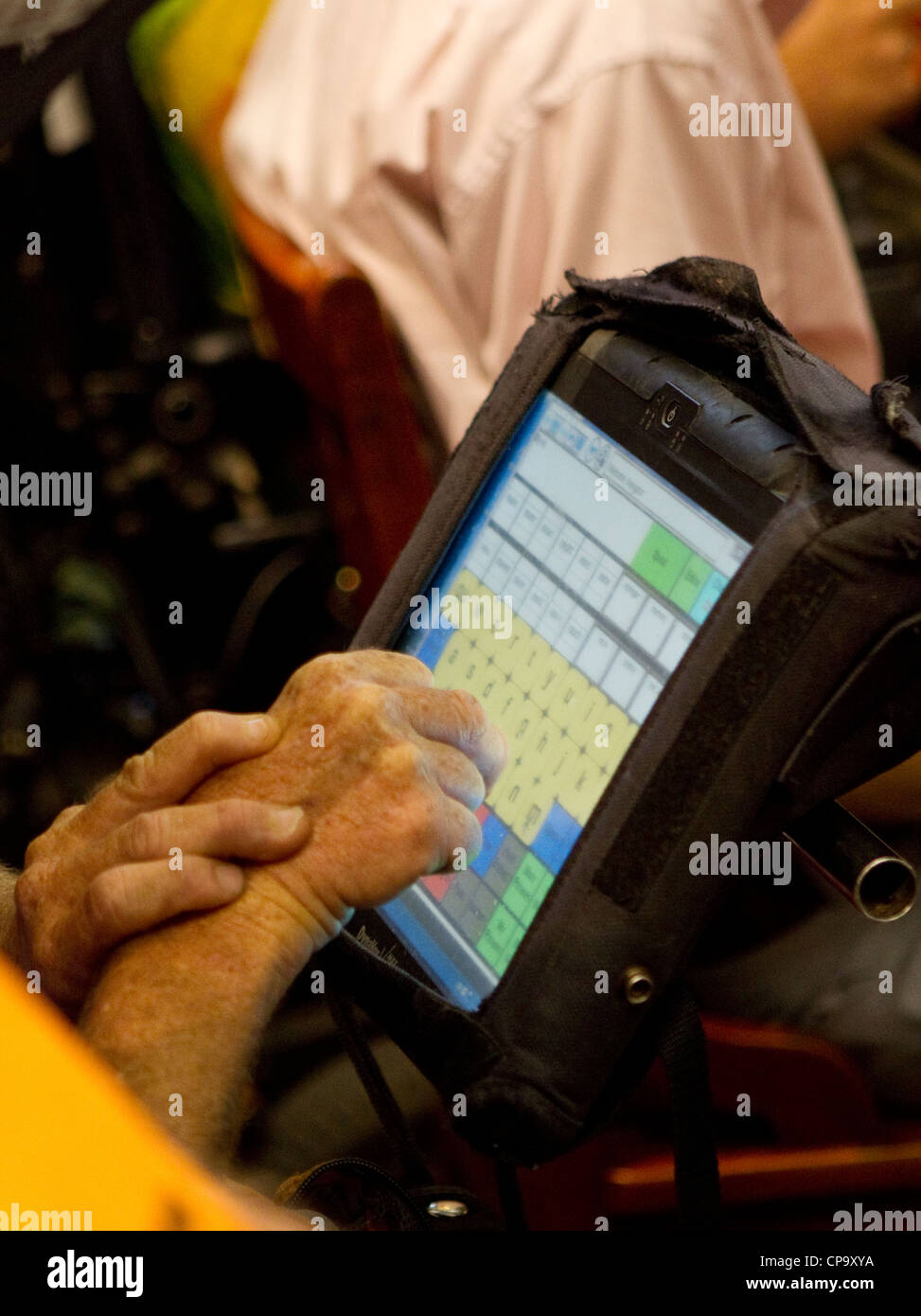 Physically disabled man uses special computer keyboard on his