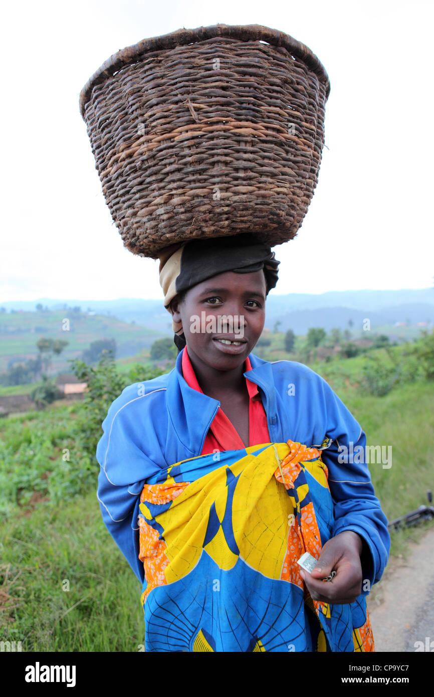 African woman carrying basket on head hires stock photography and