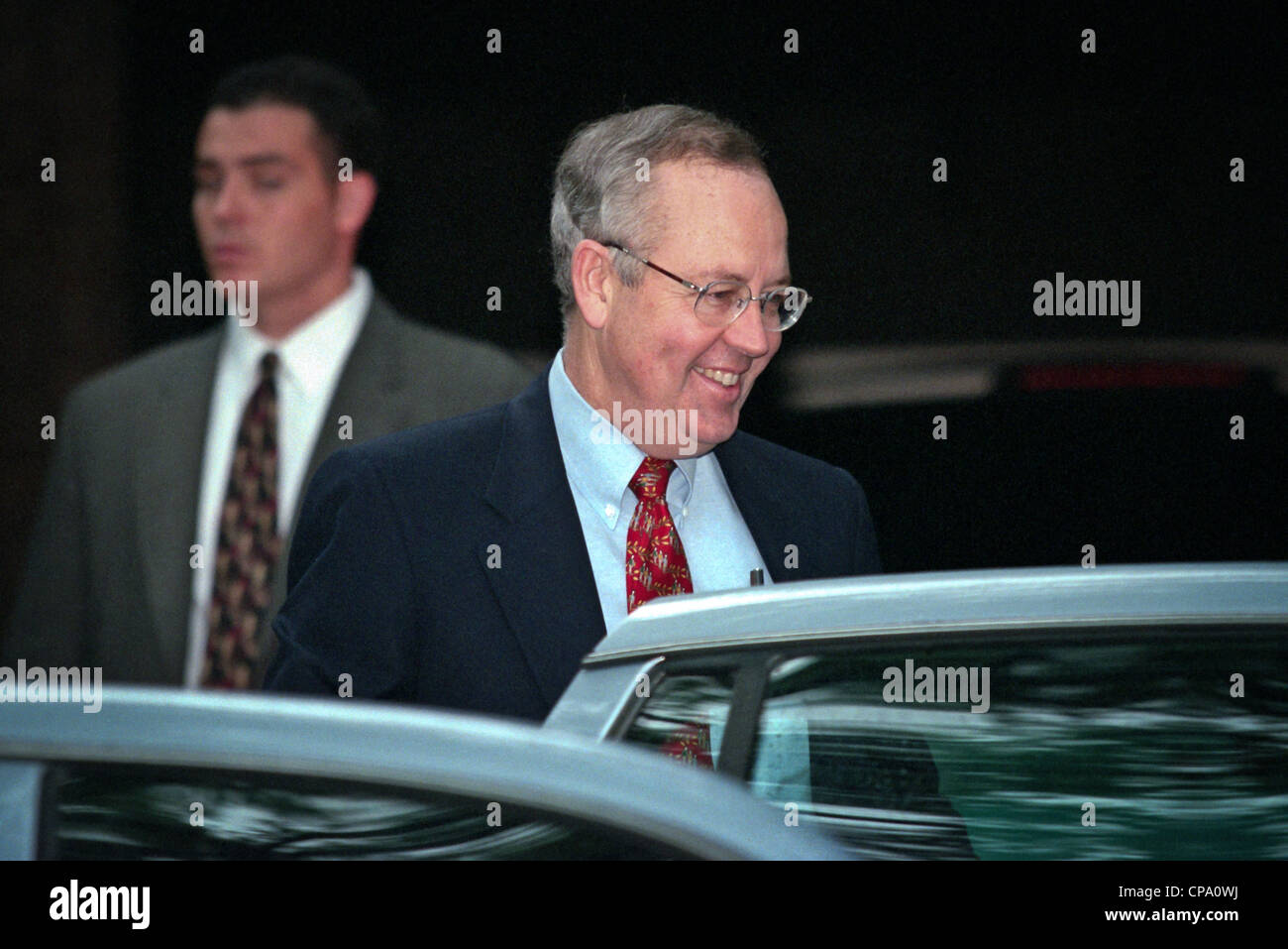 Kenneth Starr, the independent prosecutor investigating President Clinton's affair with former White House intern Monica Lewinsky gets into his car July 31, 1998 at his home in McLean, VA. Stock Photo