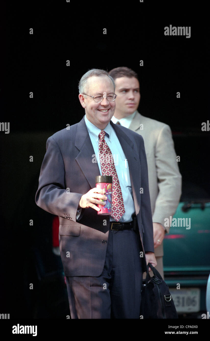 Kenneth Starr, the independent prosecutor investigating President Clinton's affair with former White House intern Monica Lewinsky gets into his car July 23, 1998 at his home in McLean, VA. Stock Photo