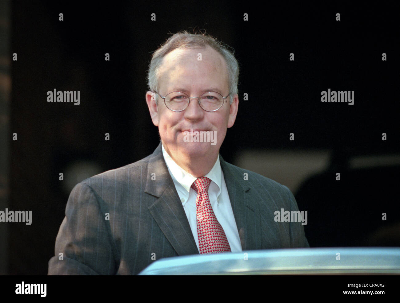 Kenneth Starr, the independent prosecutor investigating President Clinton's affair with former White House intern Monica Lewinsky gets into his car September 10, 1998 at his home in McLean, VA. Stock Photo
