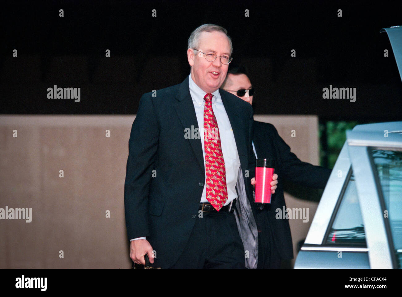Kenneth Starr, the independent prosecutor investigating President Clinton's affair with former White House intern Monica Lewinsky gets into his car September 10, 1998 at his home in McLean, VA. Stock Photo