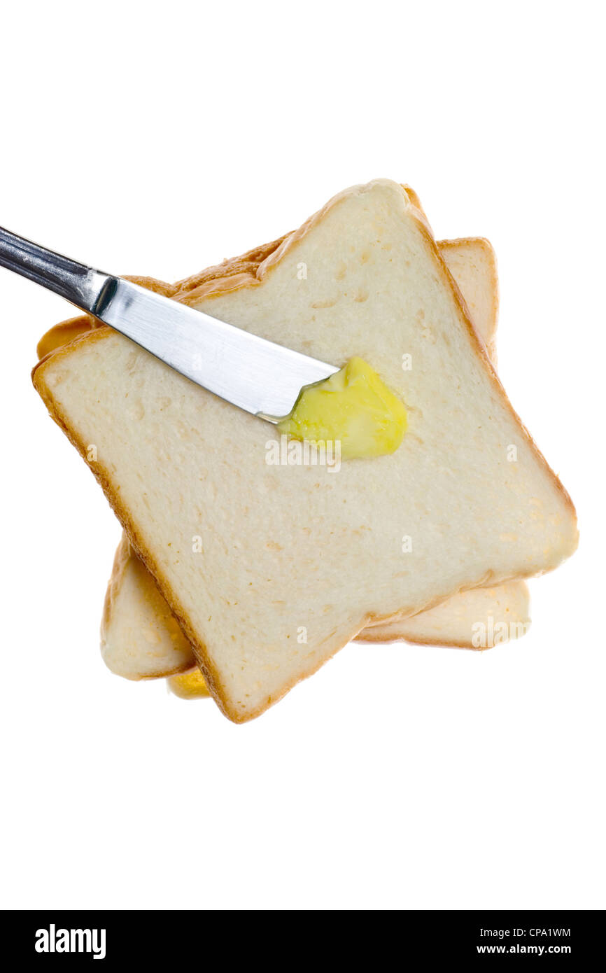 Slices of bread and butter isolated on white background Stock Photo - Alamy
