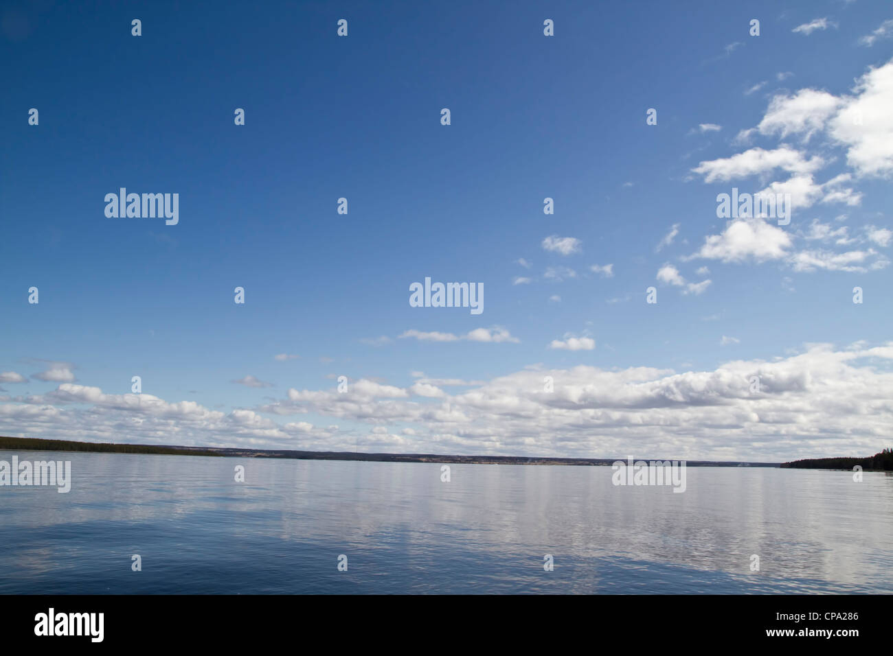 Beautiful landscape of blue sky and lake Stock Photo - Alamy